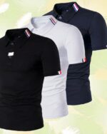 Trois polos à manches courtes sur un fond jaune.