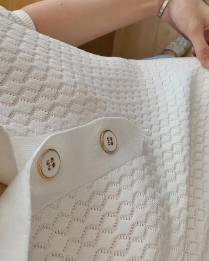 Polo beige avec motif torsadé avec 2 boutons